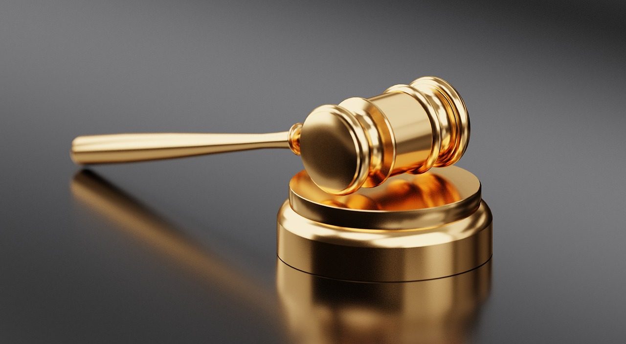 Gold judge’s gavel resting on a sound block, representing Alia Club Resort timeshare relinquishment legal help