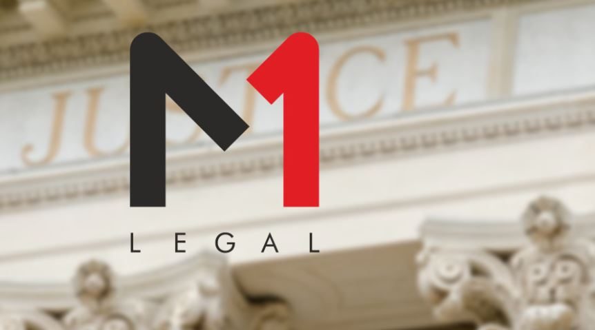 M1 Legal logo over a blurred courthouse facade with stone columns and the word JUSTICE in the background