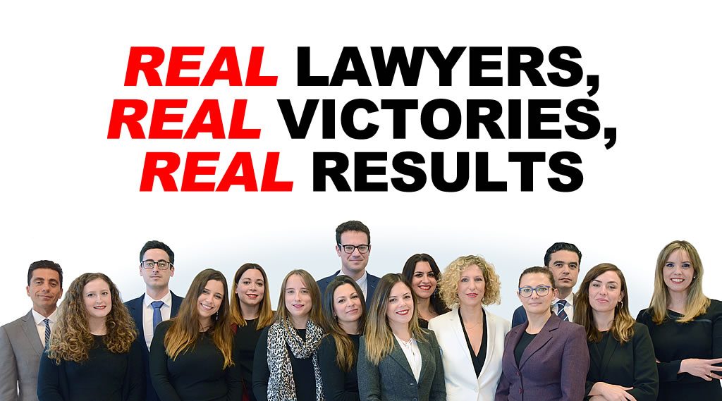 Group of solicitors in business attire standing beneath the headline “Real lawyers, real victories, real results”