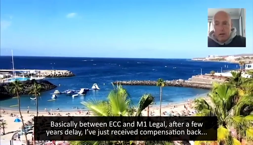 Beach and marina with palm trees, overlaid with a small video call headshot and on-screen captions mentioning ECC and M1 Legal.