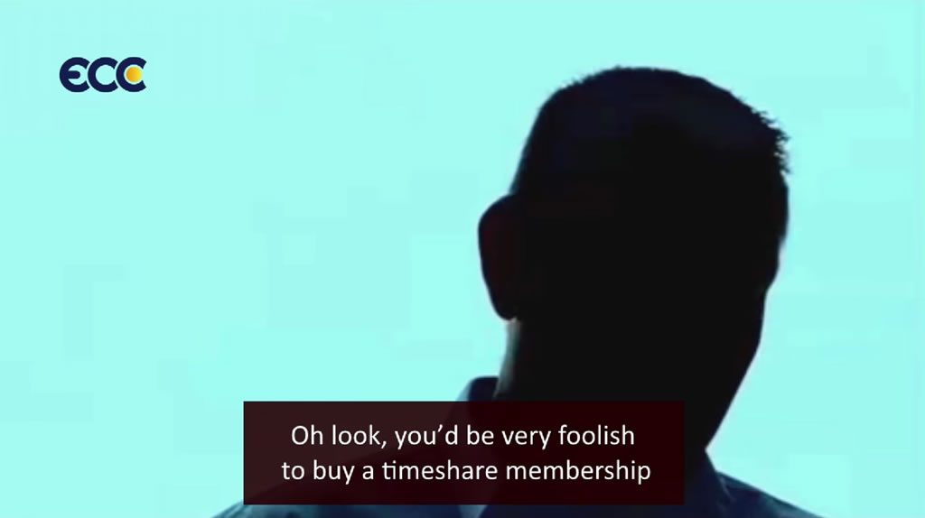 Silhouette of a man against a blue background with on-screen subtitle about buying a timeshare membership and ECC logo in the corner