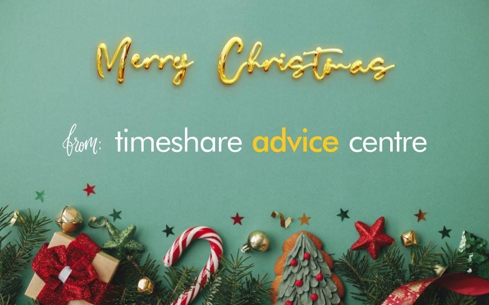 Christmas greeting graphic reading “Merry Christmas from timeshare advice centre” above festive decorations, gifts and candy canes on a teal background