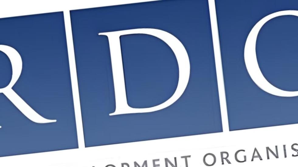 Close-up of the Resort Development Organisation (RDO) logo on a blue background