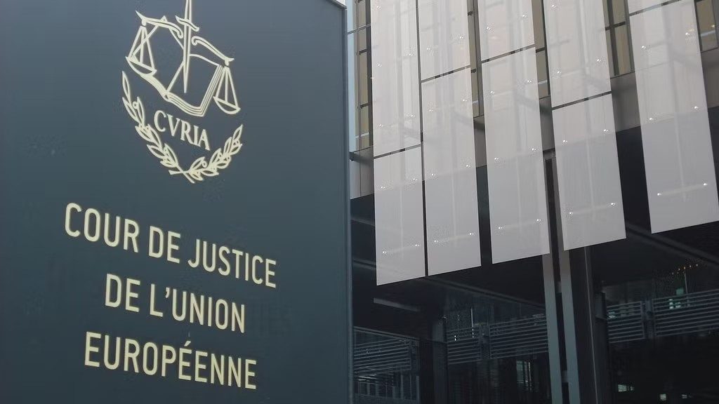 Exterior of the Court of Justice of the European Union building with the emblem and French sign “Cour de Justice de l’Union Européenne”