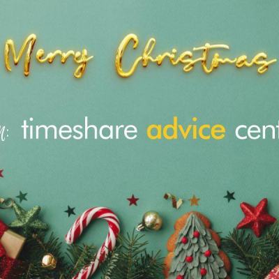 Christmas greeting graphic reading “Merry Christmas from timeshare advice centre” above festive decorations, gifts and candy canes on a teal background